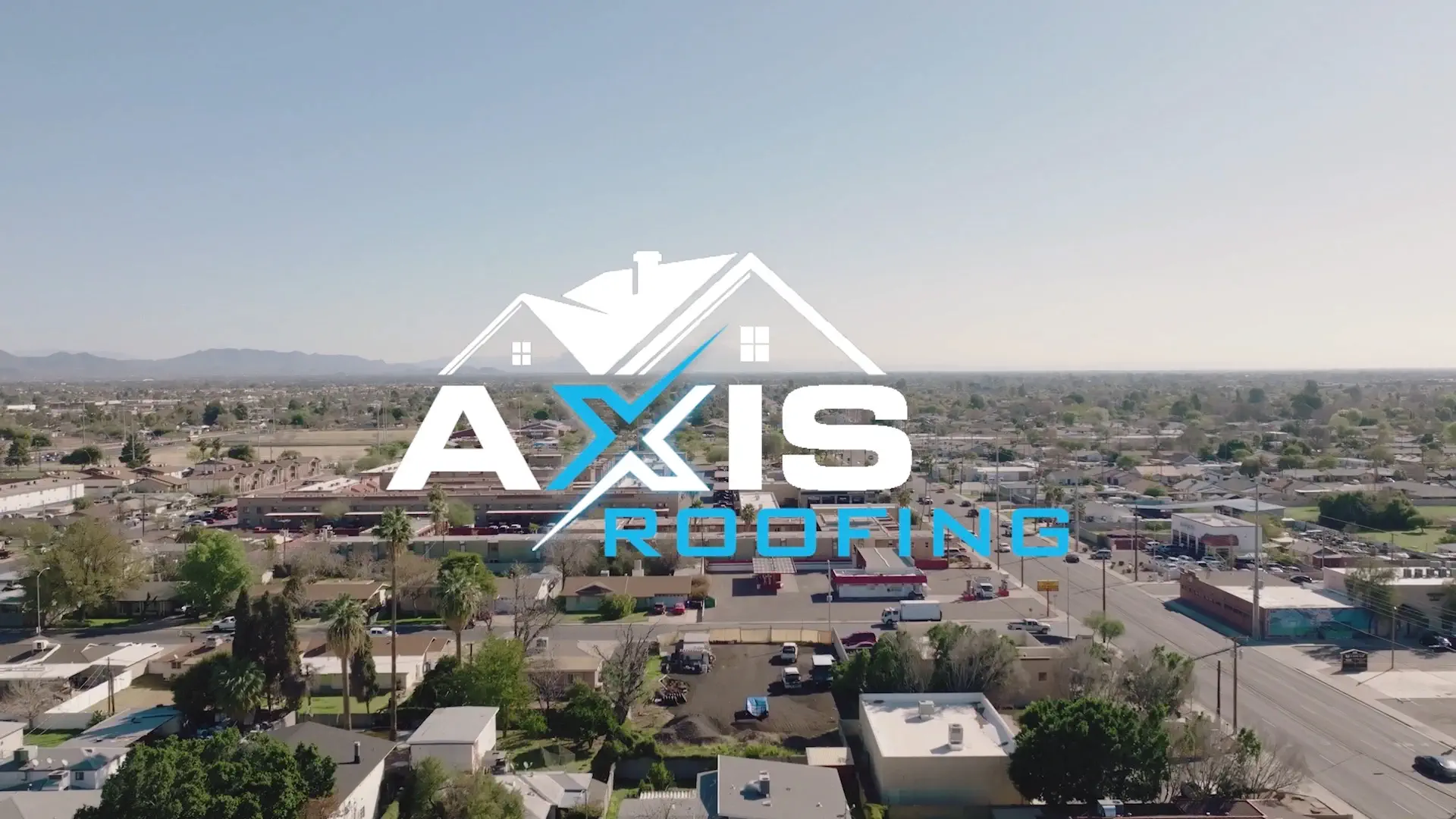 Axis Roofing Logo Over Phoenix Ariel View