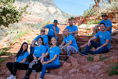 Axis Team Sitting On Rocks