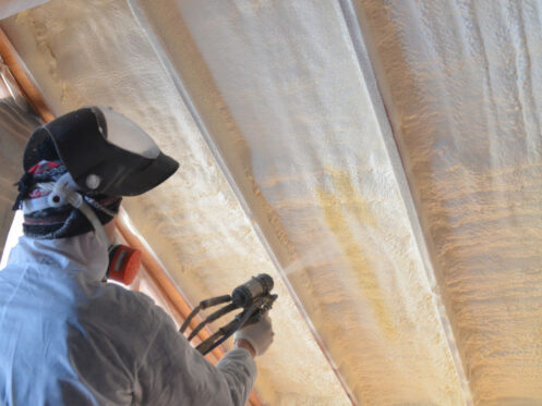 Roofer Spraying Foam Insulation in Mesa, AZ